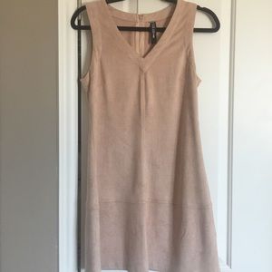Dress with gold accent zip.